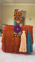 Load and play video in Gallery viewer, Paja Toquilla Fringe Bag/Hand Embroidered Strap/Peruvian Artisan Bag/Boho Crossbody Clutch/Handmade in Peru - Rust/Turquoise Orange Strap
